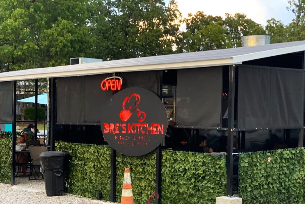 Branson food truck court with neon signage