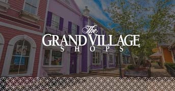 Grand Village Shops colorful Victorian storefronts and courtyard